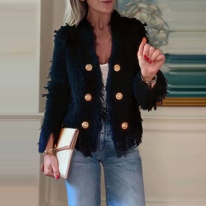 Veste à franges élégante et pointue.