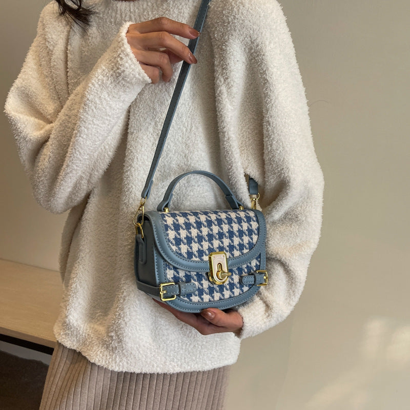 Sac à bandoulière à motif pied-de-poule.