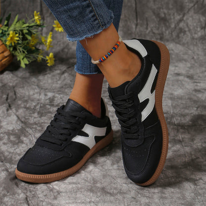 Chaussures plates à lacets color block.