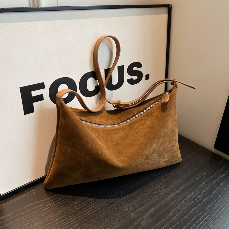 Sac de niche en daim.