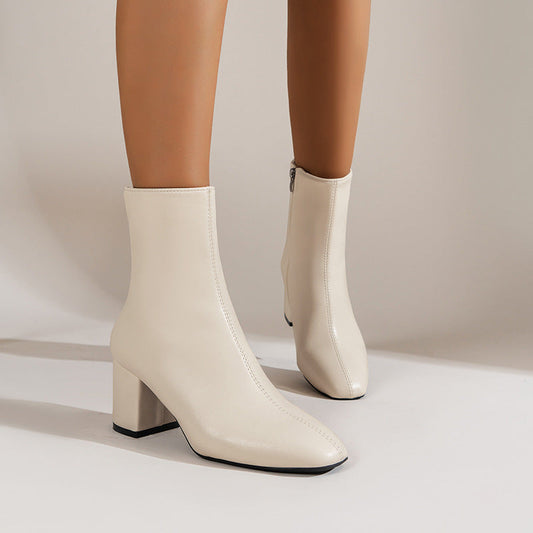 Bottes à talons épais bout pointu femme.