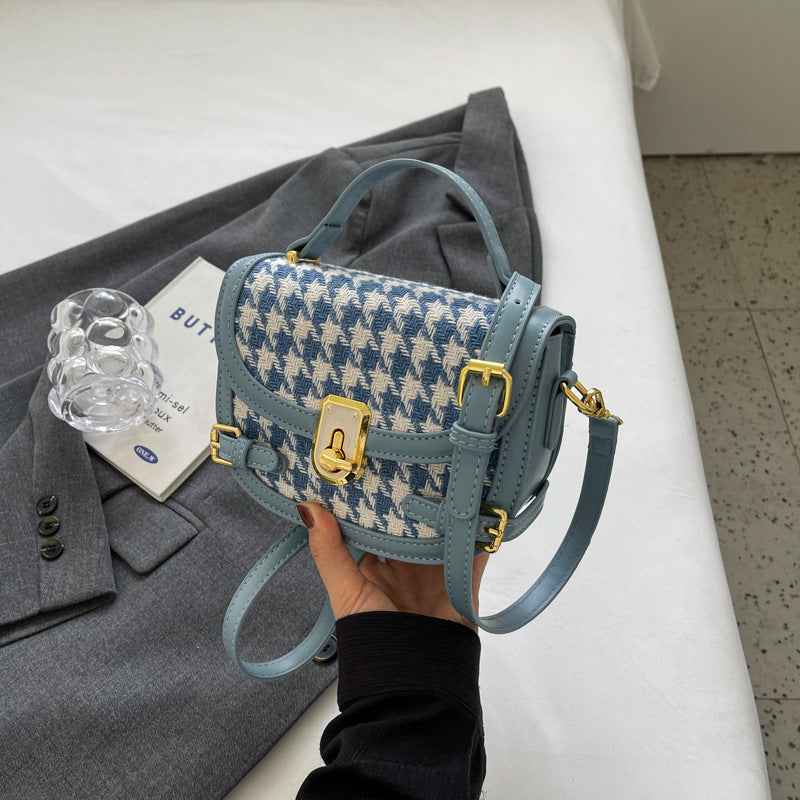 Sac à bandoulière à motif pied-de-poule.