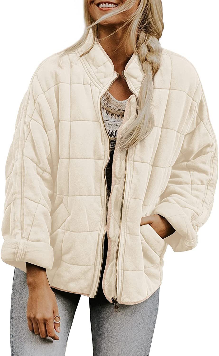 Manteau d'hiver zippé à col montant et poches, vue de face.