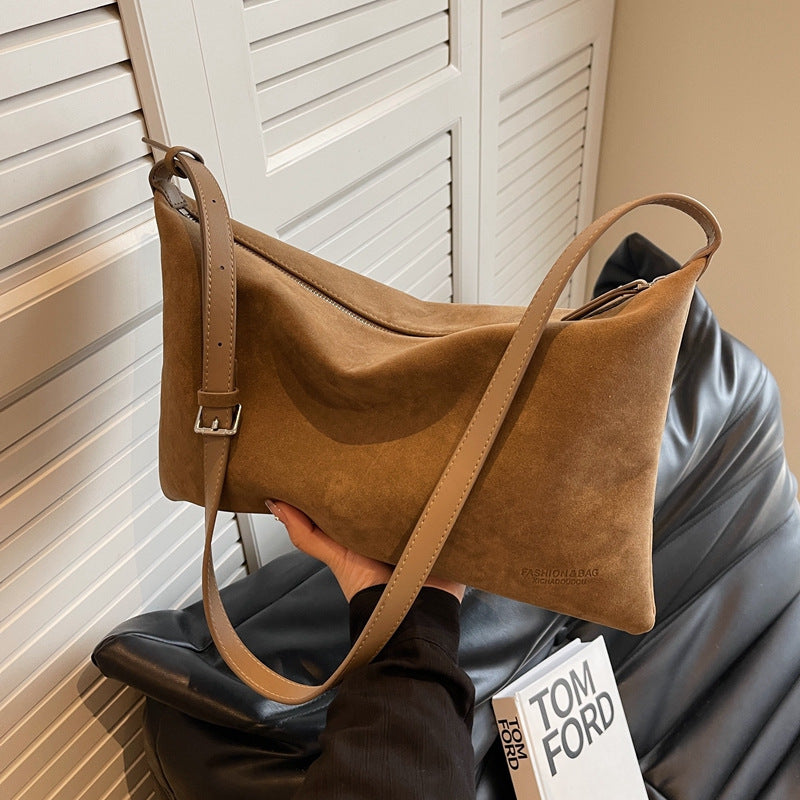 Sac de niche en daim.