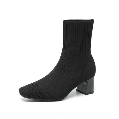 Bottes fines à talons épais et élastiques.