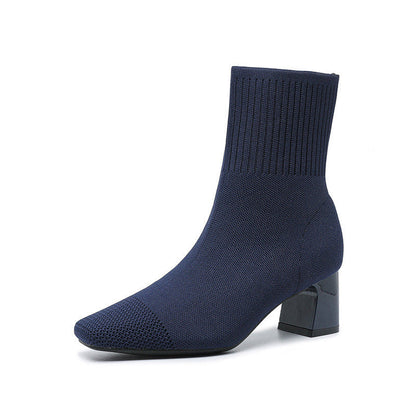 Bottes fines à talons épais et élastiques.