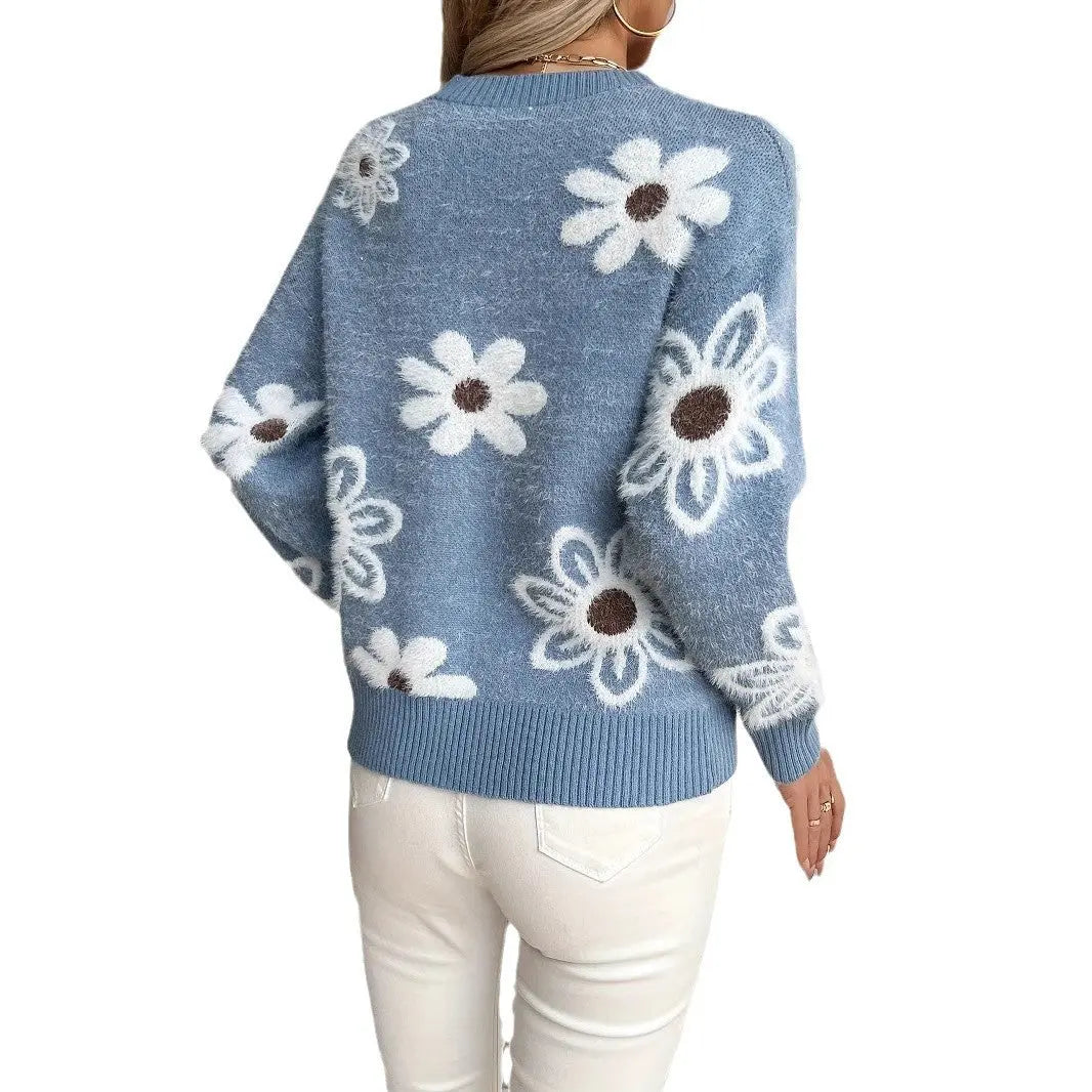 Pull tricoté à fleurs.
