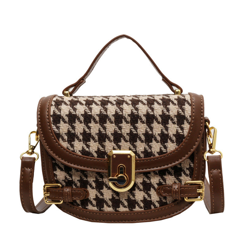 Sac à bandoulière à motif pied-de-poule.