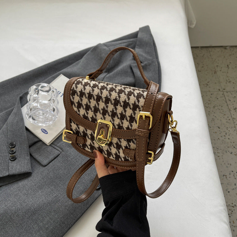 Sac à bandoulière à motif pied-de-poule.