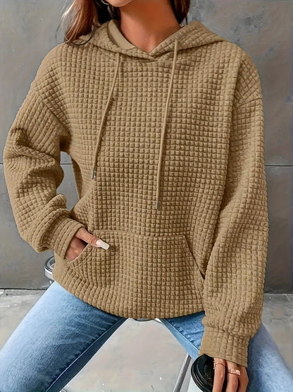 Pull ample décontracté à manches longues.