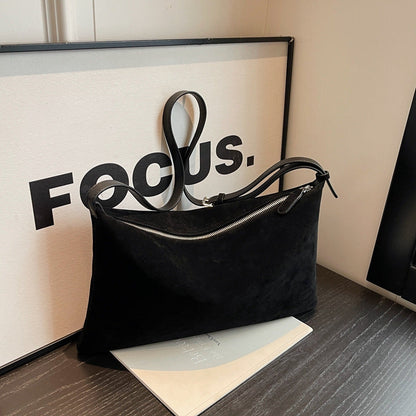 Sac de niche en daim.