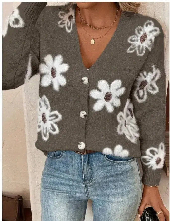 Cardigan boutonné à imprimé floral.
