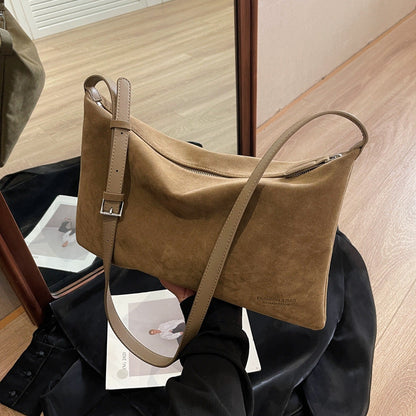 Sac de niche en daim.