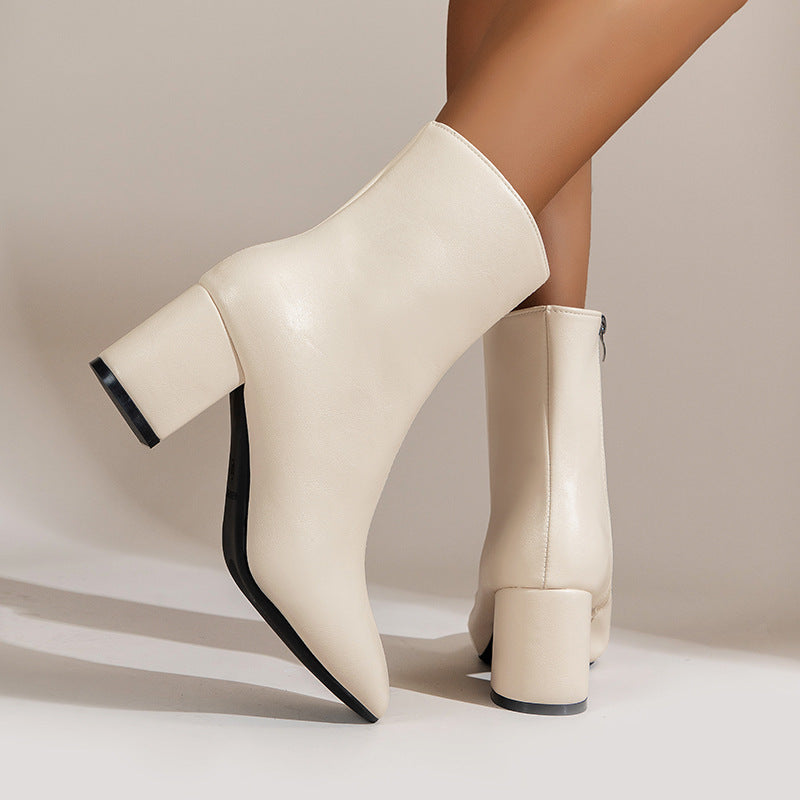 Bottes à talons épais bout pointu femme.