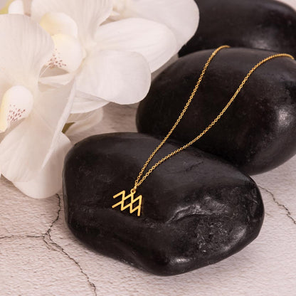 Collier avec symbole du zodiaque