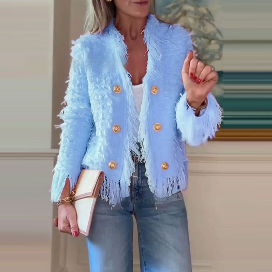 Veste à franges élégante et pointue.