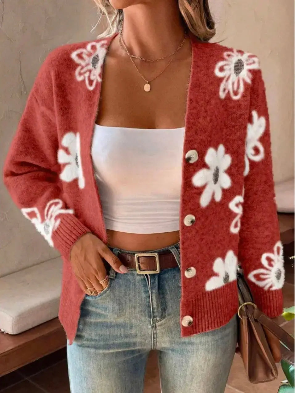 Cardigan boutonné à imprimé floral.
