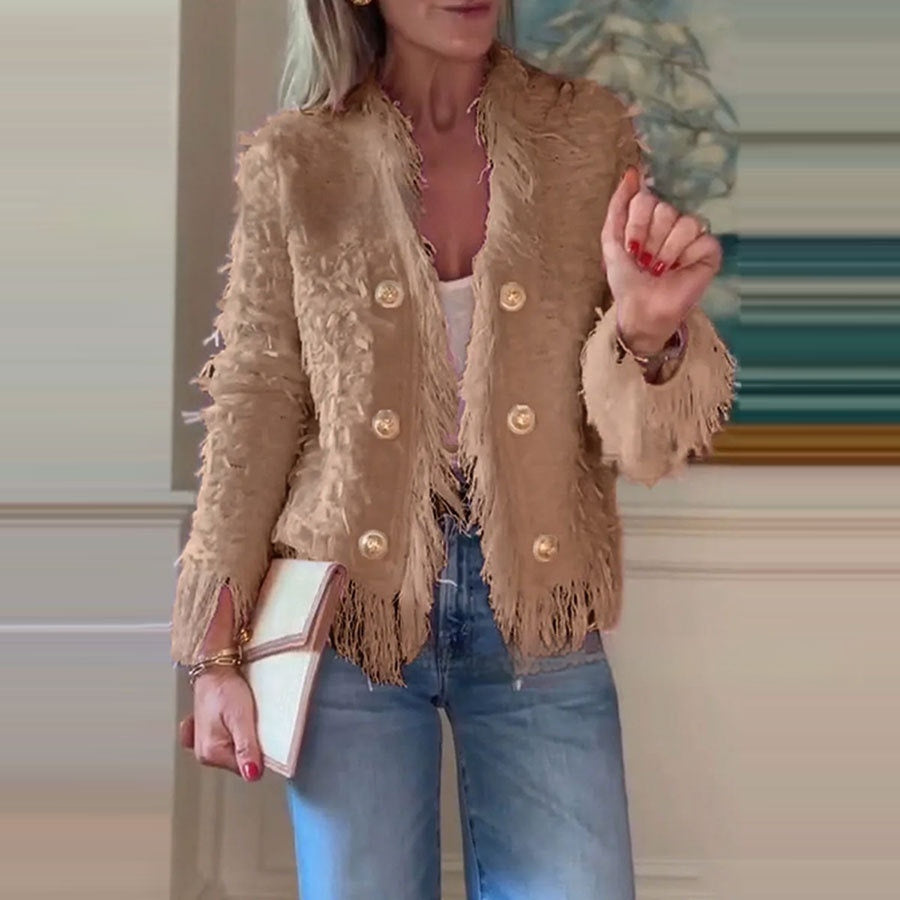 Veste à franges élégante et pointue.
