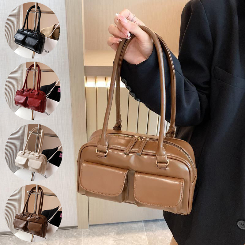 Sac à bandoulière multi-poches pour femme.