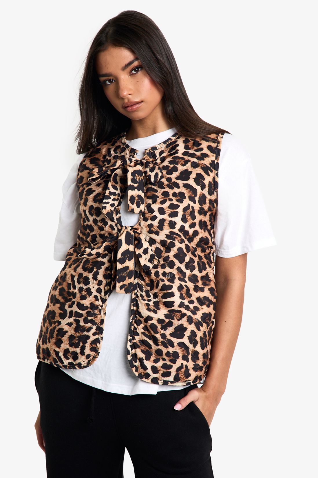 Gilet matelassé à détail noeud léopard.